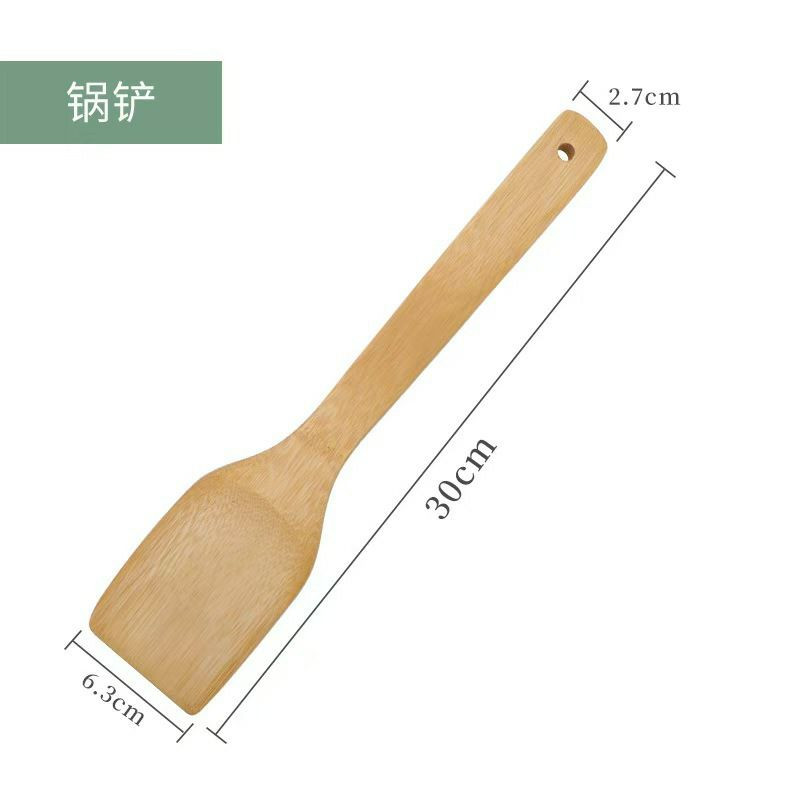 Ensemble d'ustensiles de cuisine en bambou présenté avec son pot de rangement et sa boîte en carton.