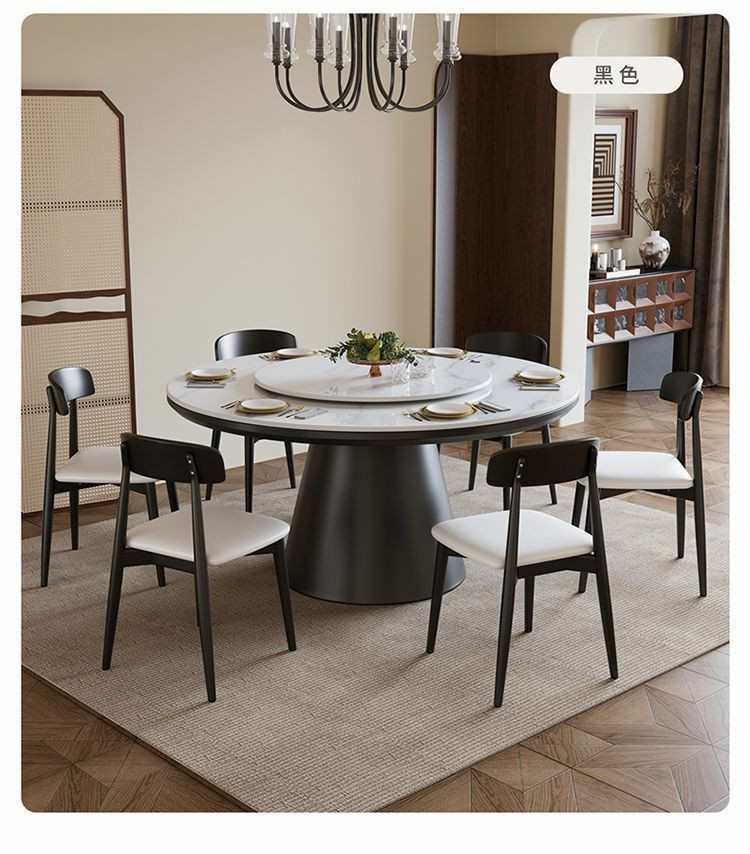 Table à manger ronde moderne en bois avec un plateau en pierre frittée et un plateau tournant central (type Lazy Susan), accompagnée de six chaises assorties au dossier incurvé et à l'assise grise.